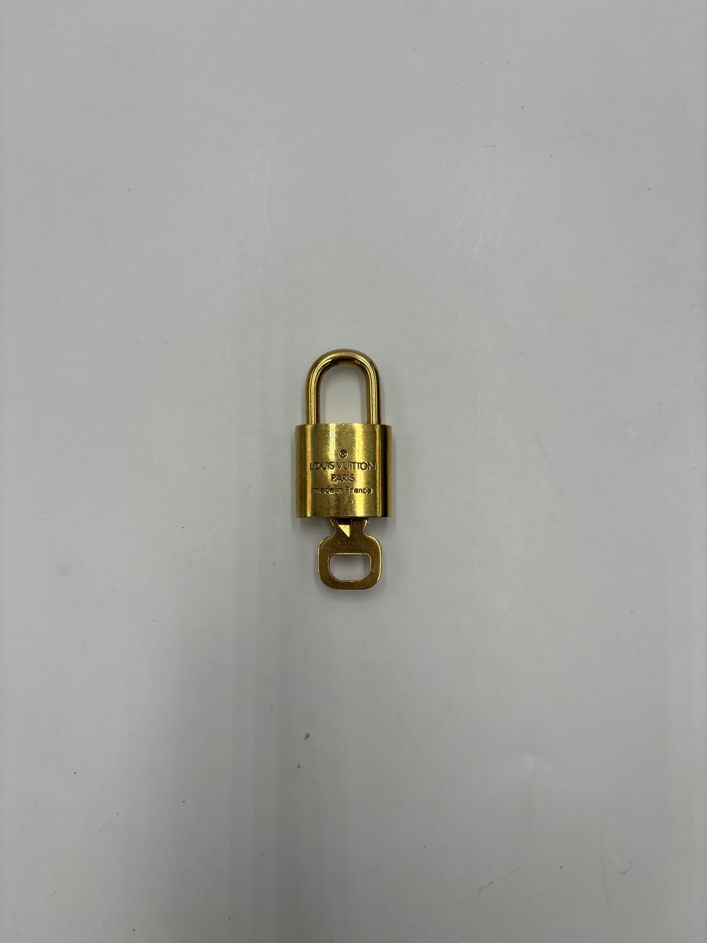 Louis Vuitton Padlock and Key Logo Cufflinks Metal Product Image