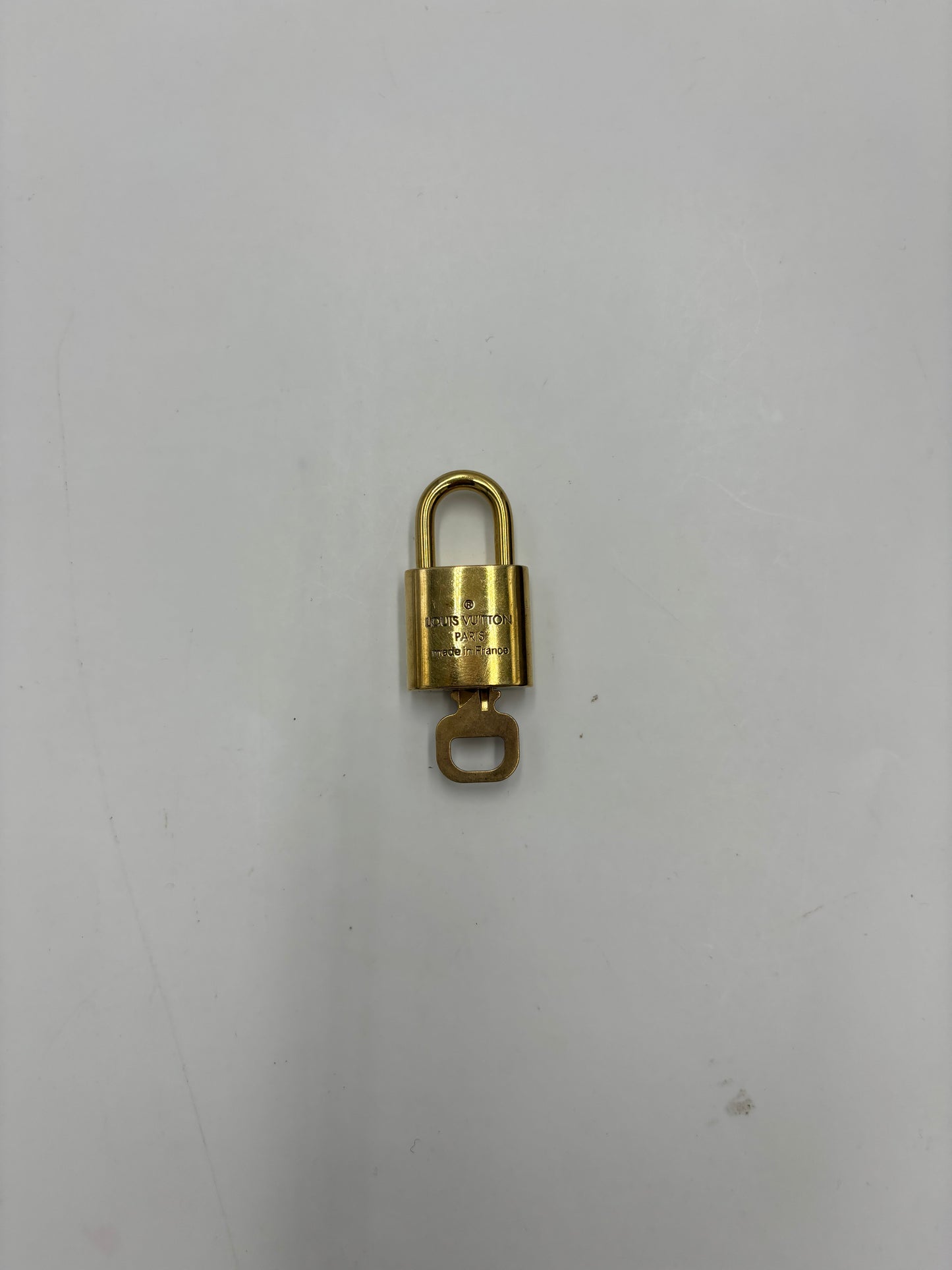 Louis Vuitton Padlock and Key Logo Cufflinks Metal Product Image