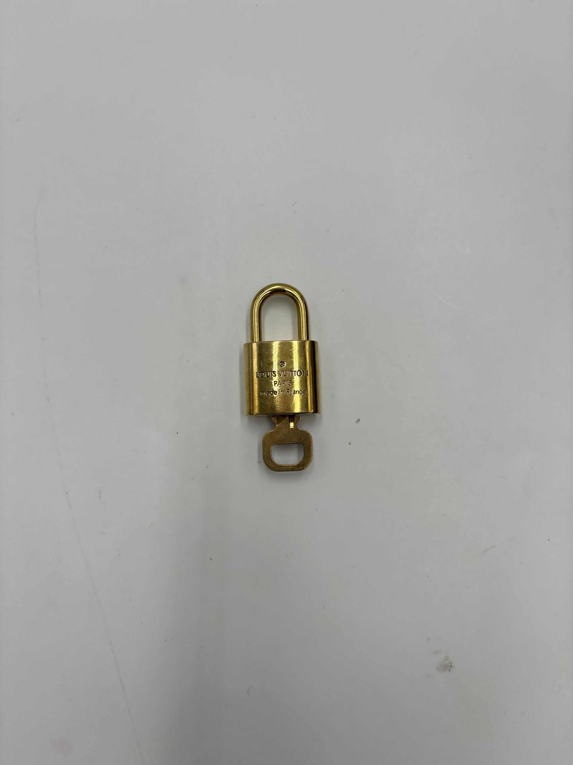 Louis Vuitton Padlock and Key Logo Cufflinks Metal Product Image