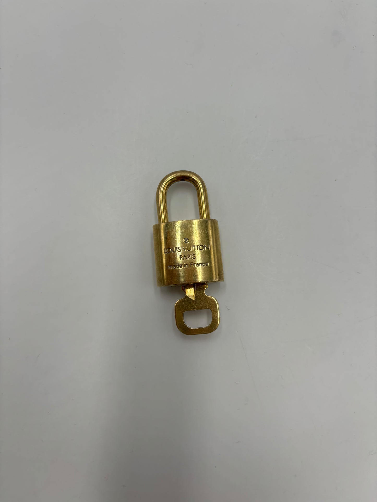 Louis Vuitton Padlock and Key Logo Cufflinks Metal Product Image
