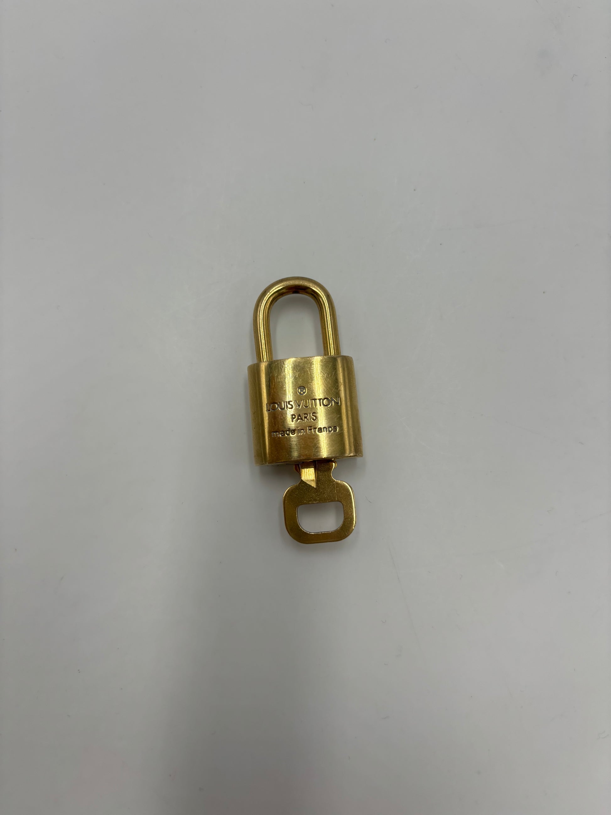 Louis Vuitton Padlock and Key Logo Cufflinks Metal Product Image