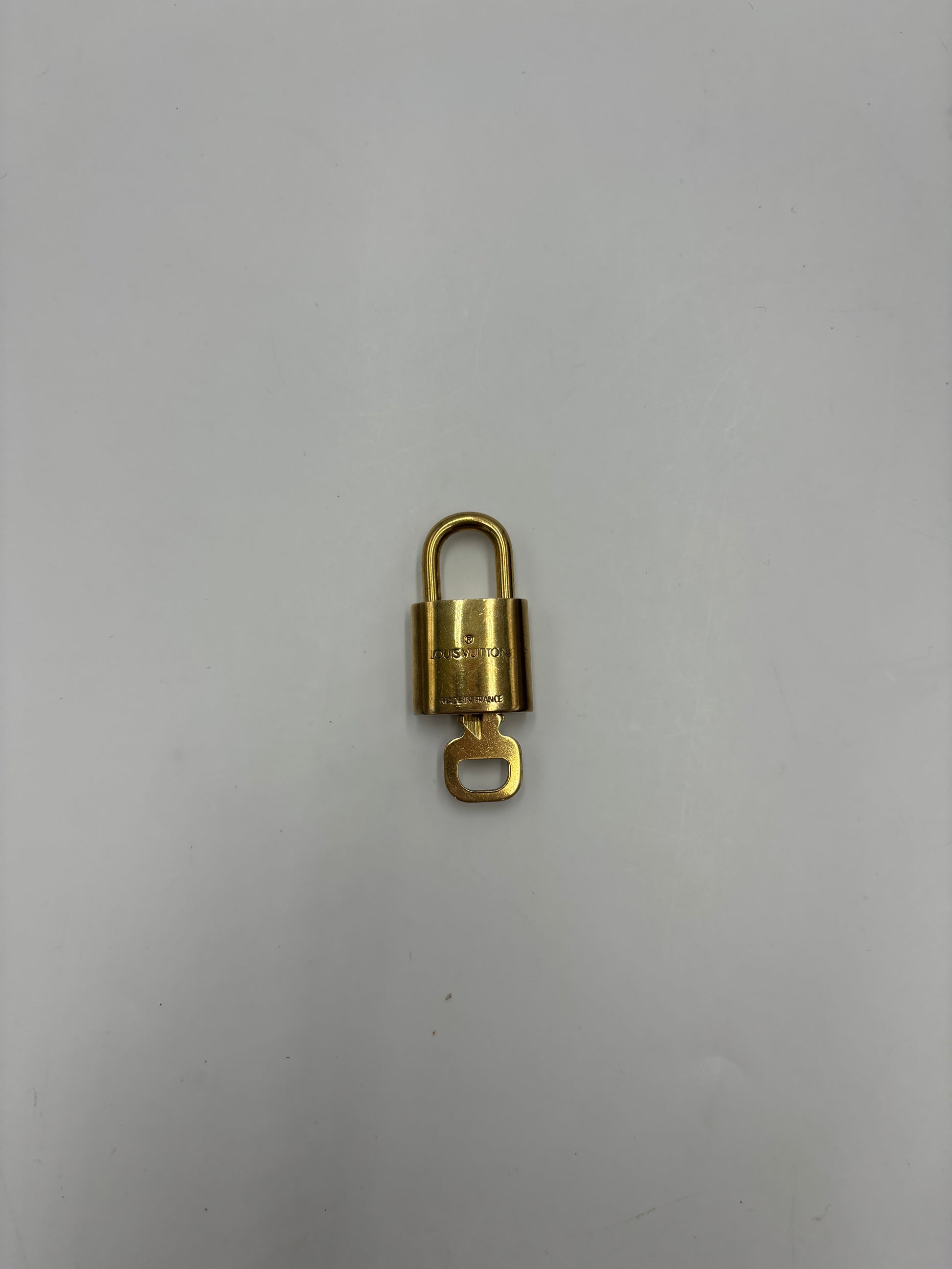 Louis Vuitton Padlock and Key Logo Cufflinks Metal Product Image