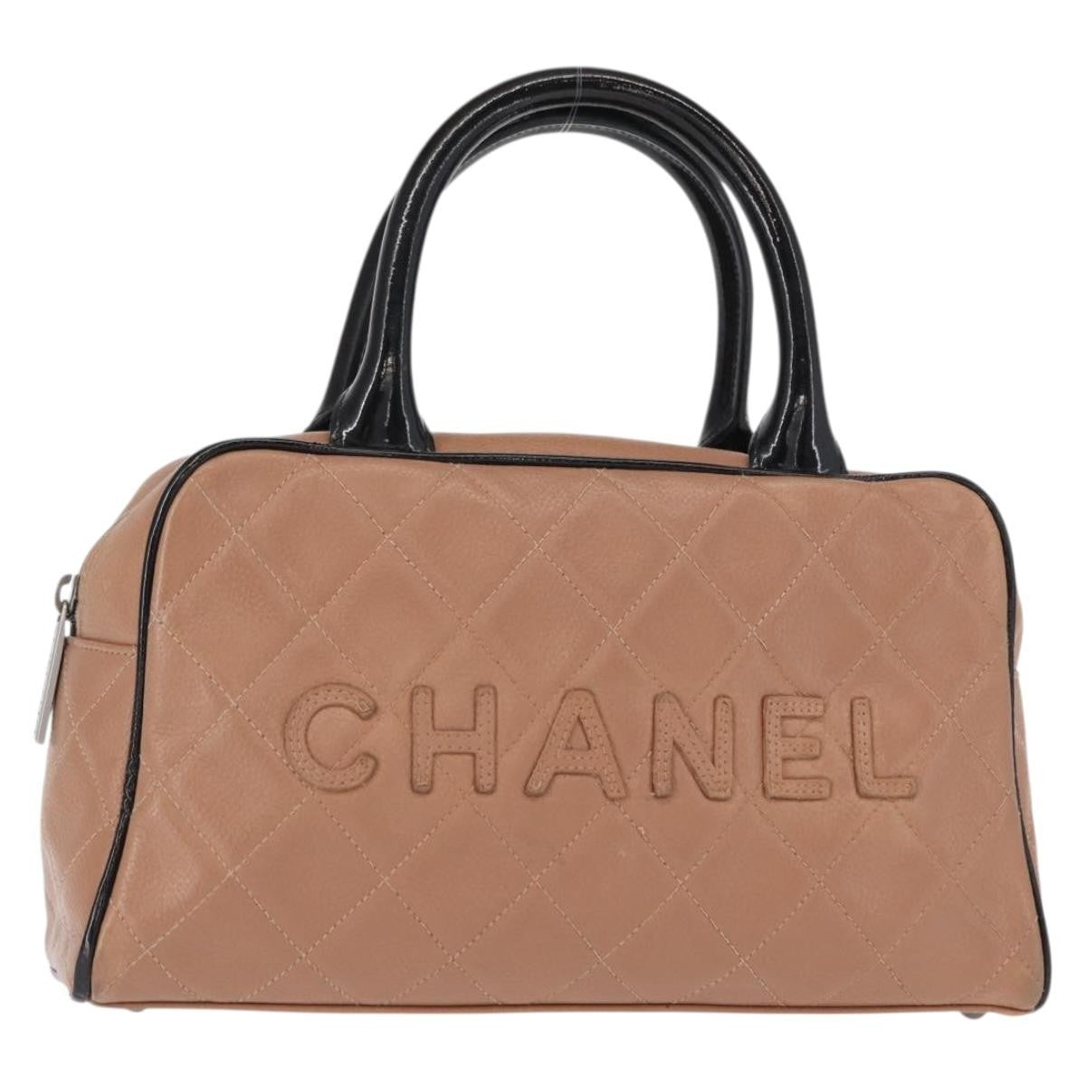 Chanel Embossed Logo Bowler Bag Quilted Caviar Small