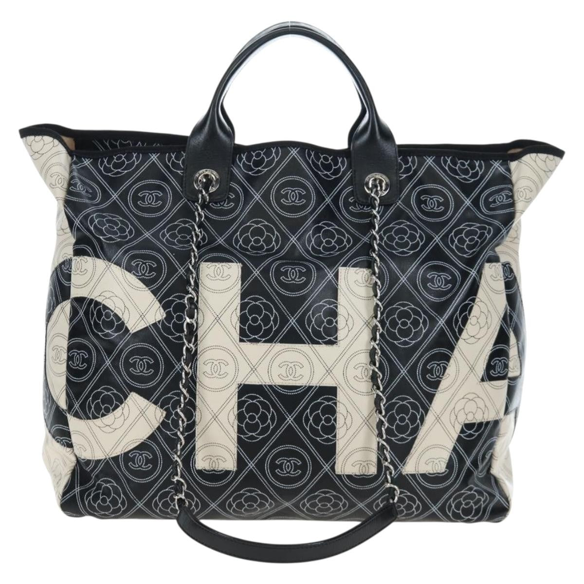 Chanel Logo Camellia Shopping Printed Coated Canvas Medium