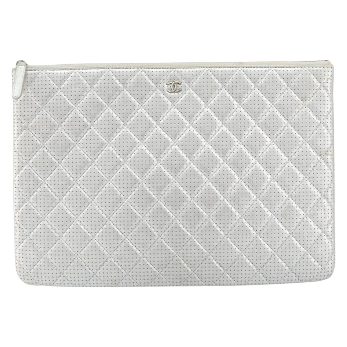 Chanel O Case Clutch Quilted Perforated Lambskin Medium